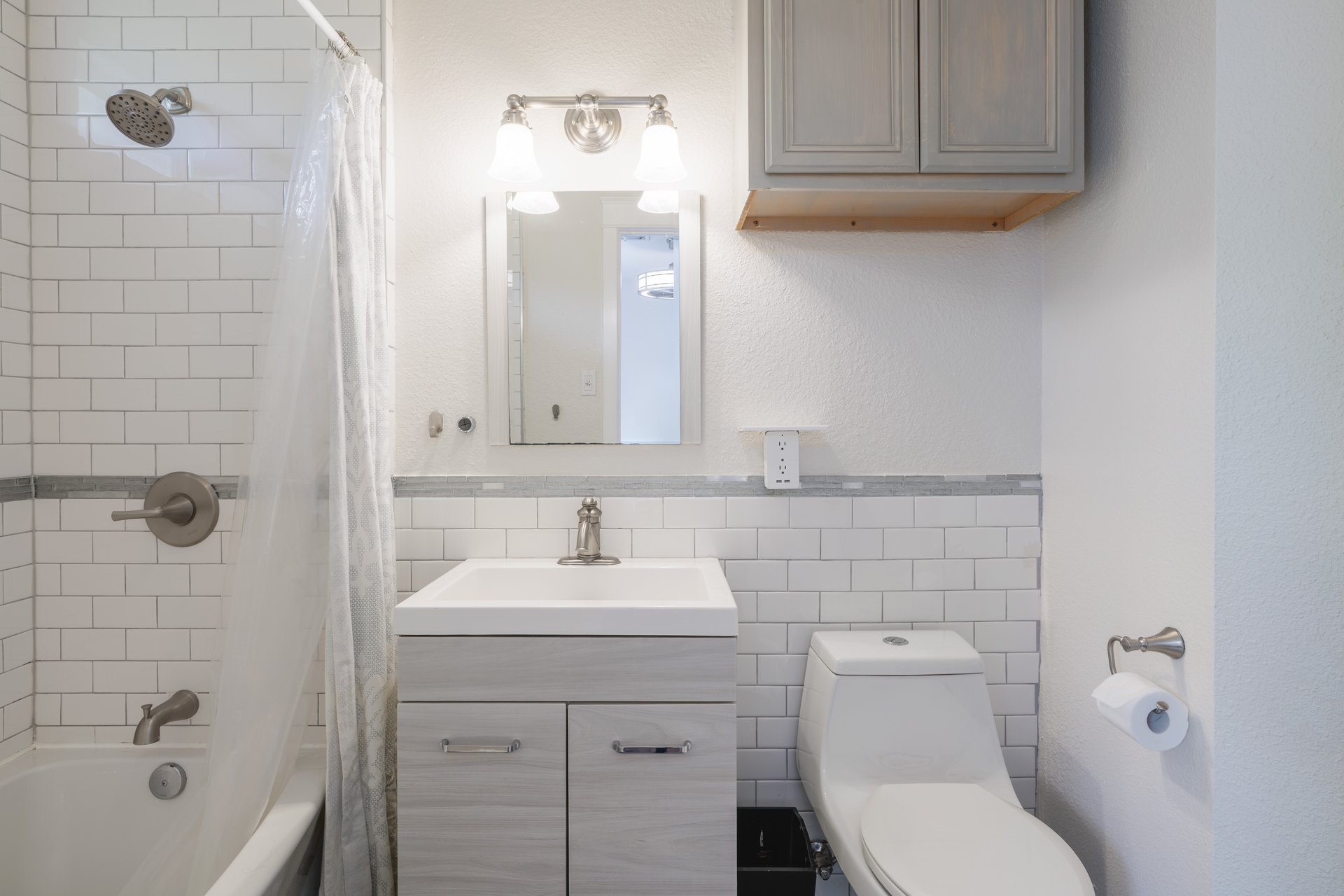 7000 Bending Oak Road Austin, TX 78749 - Photo 25 of 39 a bathroom with a sink a toilet and shower