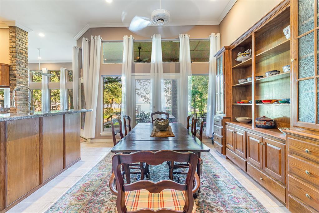 355 Beachside Drive Trinidad, TX 75163 - Photo 11 of 39 a view of a dining room with furniture window and wooden floor