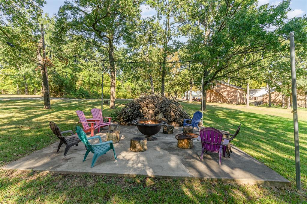 355 Beachside Drive Trinidad, TX 75163 - Photo 34 of 39 a view of a backyard with sitting area