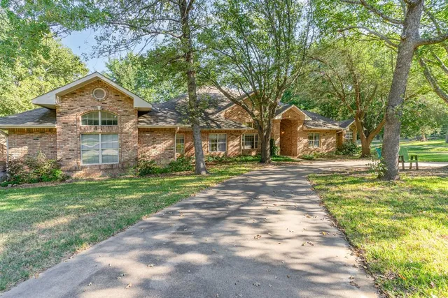 a front view of house with yard