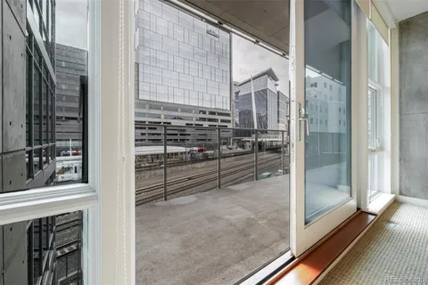 a view of a balcony with door