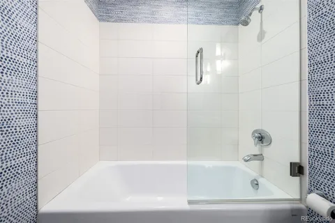 a bathroom with a bathtub