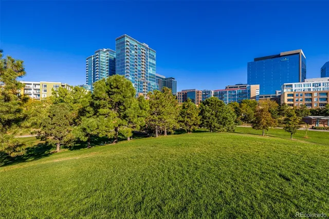 an aerial view of a swimming pool and mountain view