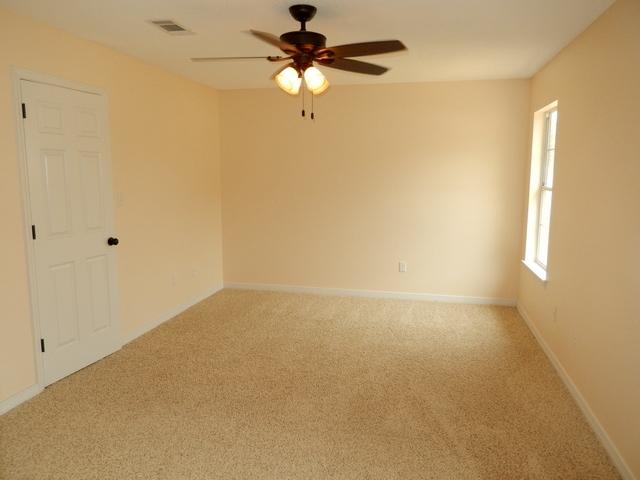 9 Stowe Road Mary Esther, FL 32569 - Photo 13 of 24 a view of a room with a window and a fan