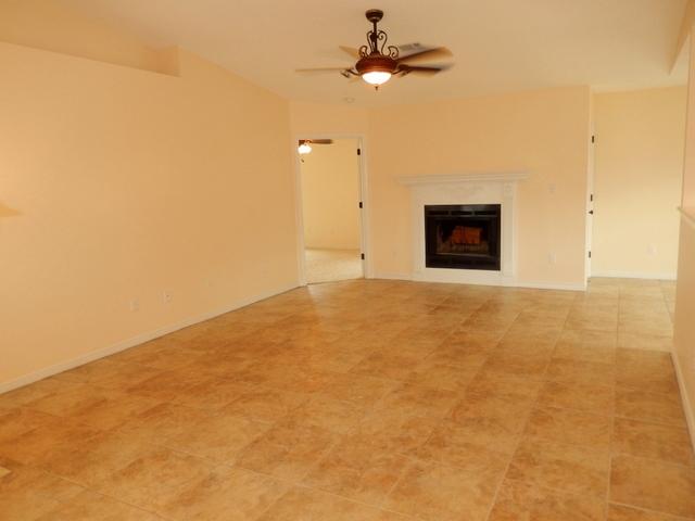 9 Stowe Road Mary Esther, FL 32569 - Photo 3 of 24 a view of an empty room with a ceiling fan
