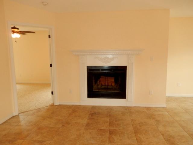 9 Stowe Road Mary Esther, FL 32569 - Photo 5 of 24 a view of an empty room with a fireplace