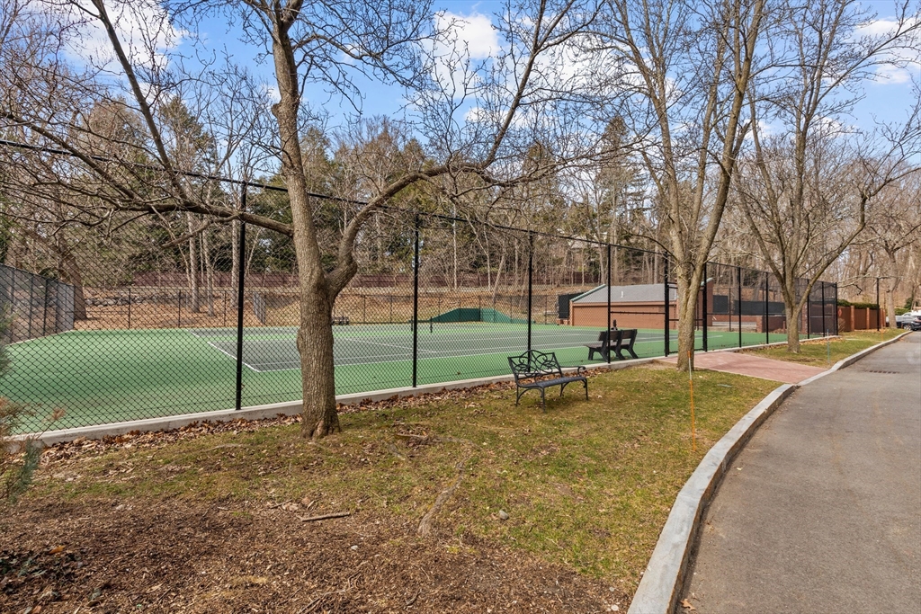 241 Perkins Street, Unit D405 Boston, MA 02130 - Photo 28 of 36 a view of a house with a yard