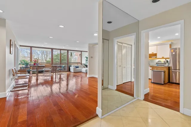 a view of a living room and hardwood floor