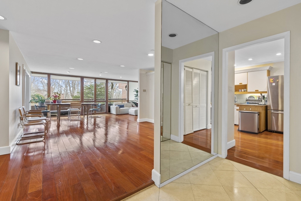 241 Perkins Street, Unit D405 Boston, MA 02130 - Photo 10 of 36 a view of a living room and hardwood floor