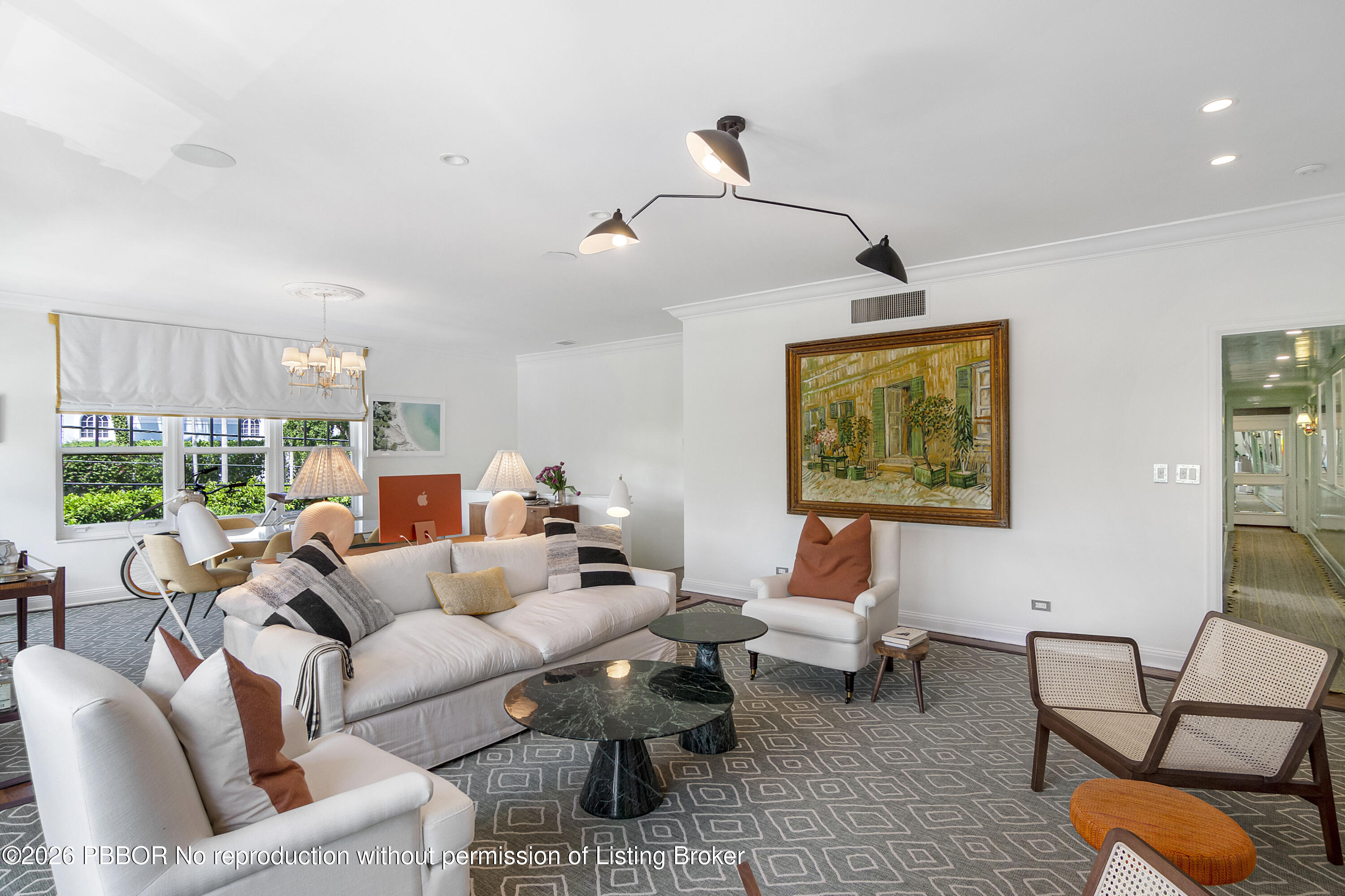 311 Cocoanut Row, Unit 201 Palm Beach, FL 33480 - Photo 1 of 12 a living room with furniture