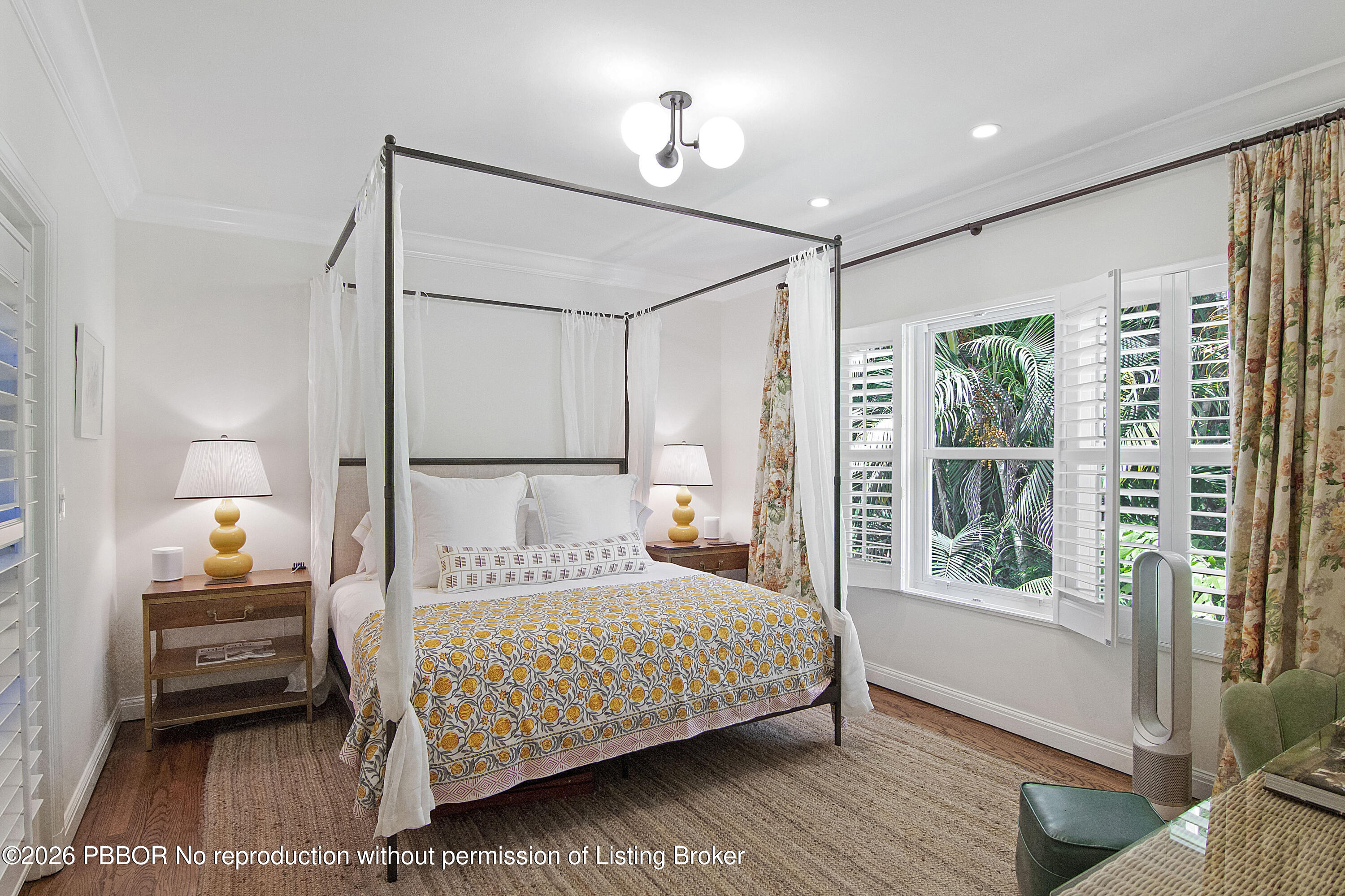 311 Cocoanut Row, Unit 201 Palm Beach, FL 33480 - Photo 5 of 12 a bedroom with a bed and a window