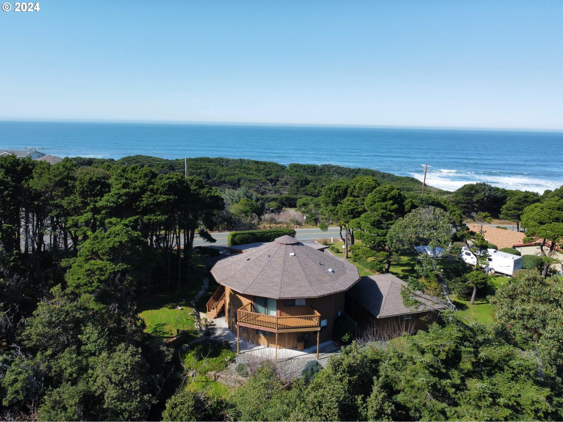 33327 Ophir Road Gold Beach, OR 97444 - Photo 1 of 32 an aerial view of a house with a yard and lake view