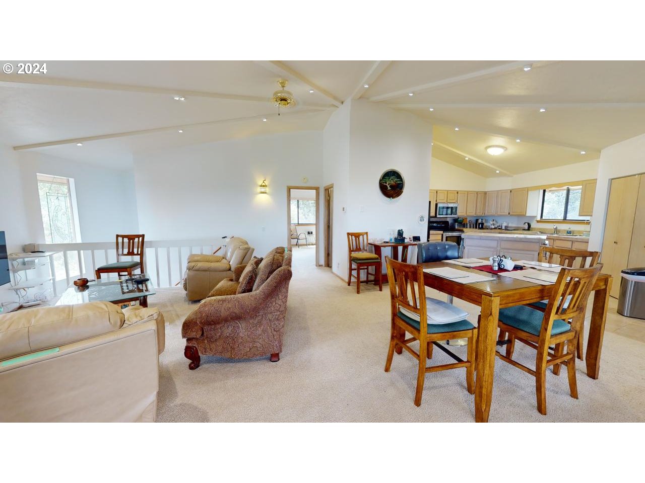 33327 Ophir Road Gold Beach, OR 97444 - Photo 12 of 32 a living room with furniture and a large window