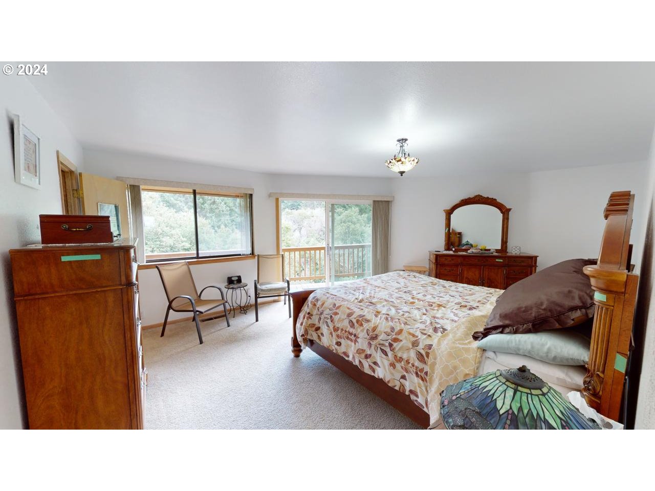 33327 Ophir Road Gold Beach, OR 97444 - Photo 16 of 32 a living room with furniture and a window
