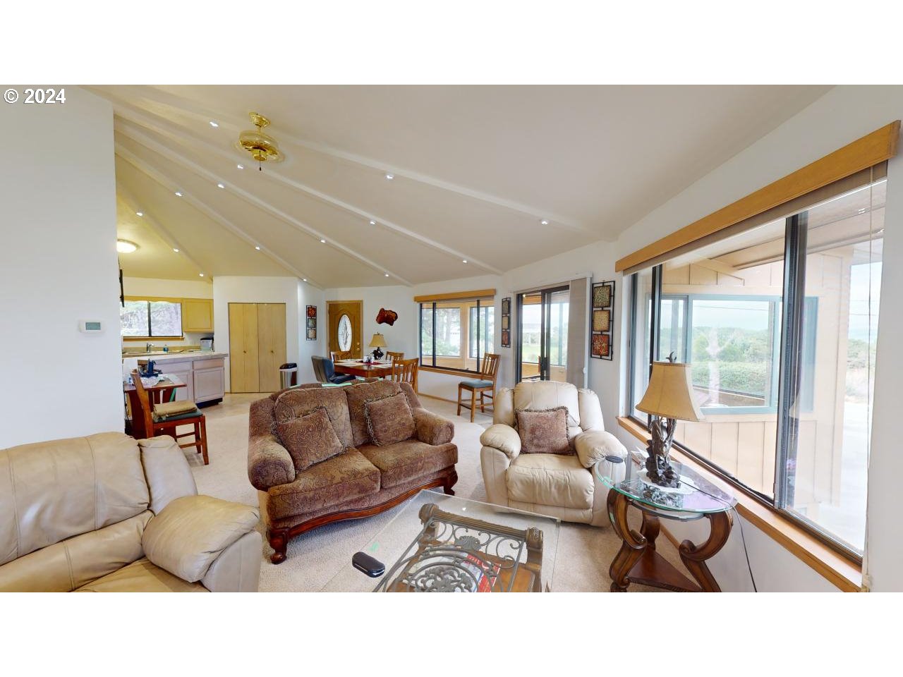 33327 Ophir Road Gold Beach, OR 97444 - Photo 19 of 32 a living room with furniture and a large window