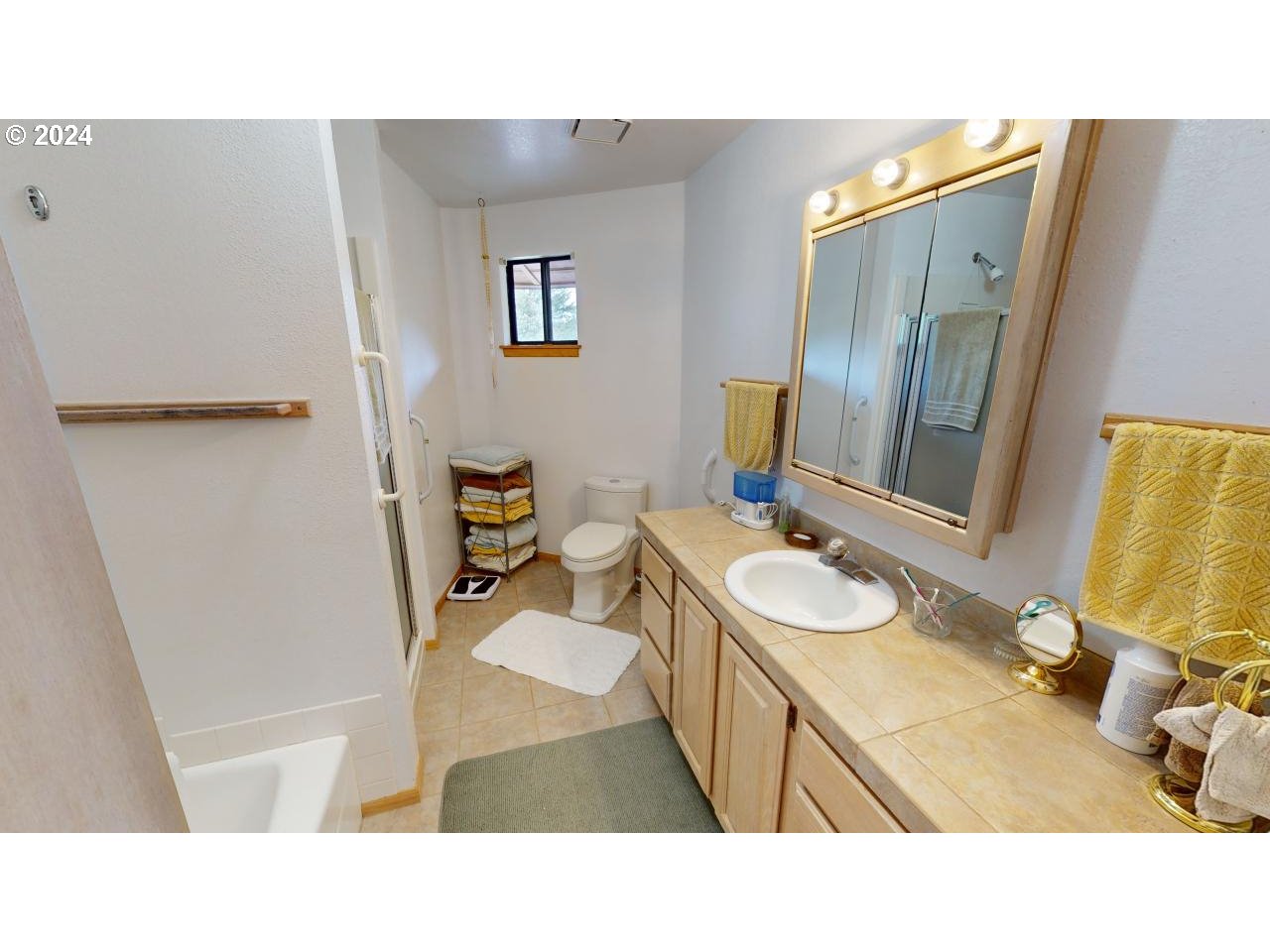 33327 Ophir Road Gold Beach, OR 97444 - Photo 20 of 32 a bathroom with a sink toilet and mirror