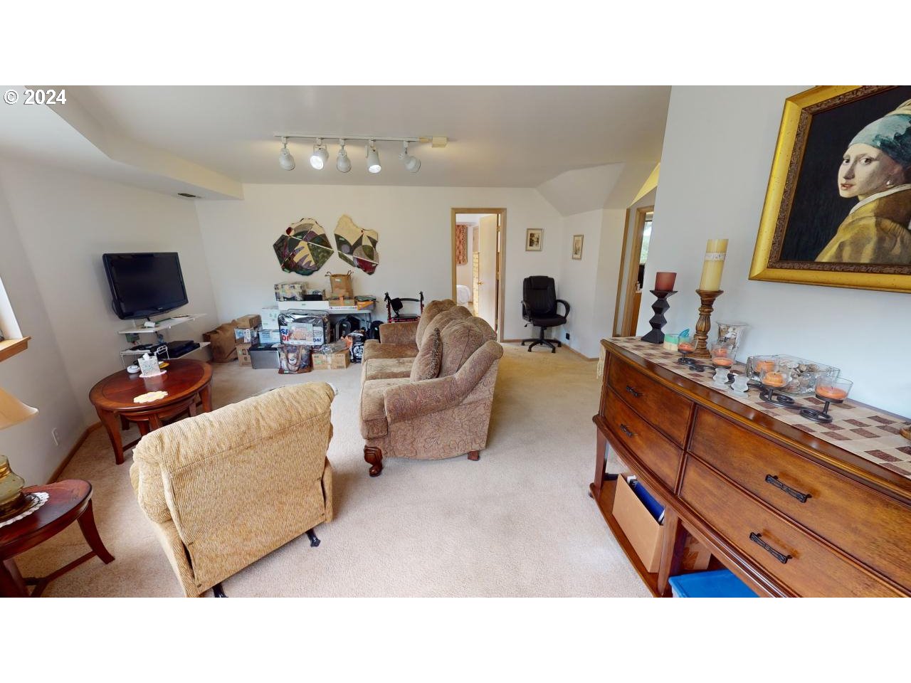 33327 Ophir Road Gold Beach, OR 97444 - Photo 21 of 32 a living room with furniture and a flat screen tv