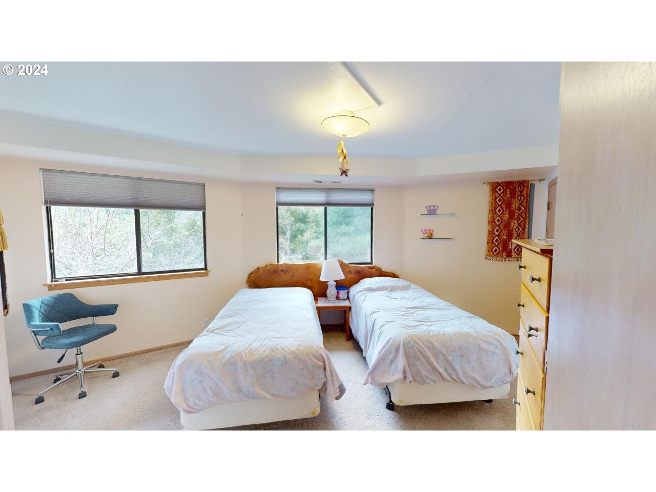 33327 Ophir Road Gold Beach, OR 97444 - Photo 23 of 32 a bedroom with two beds and a window