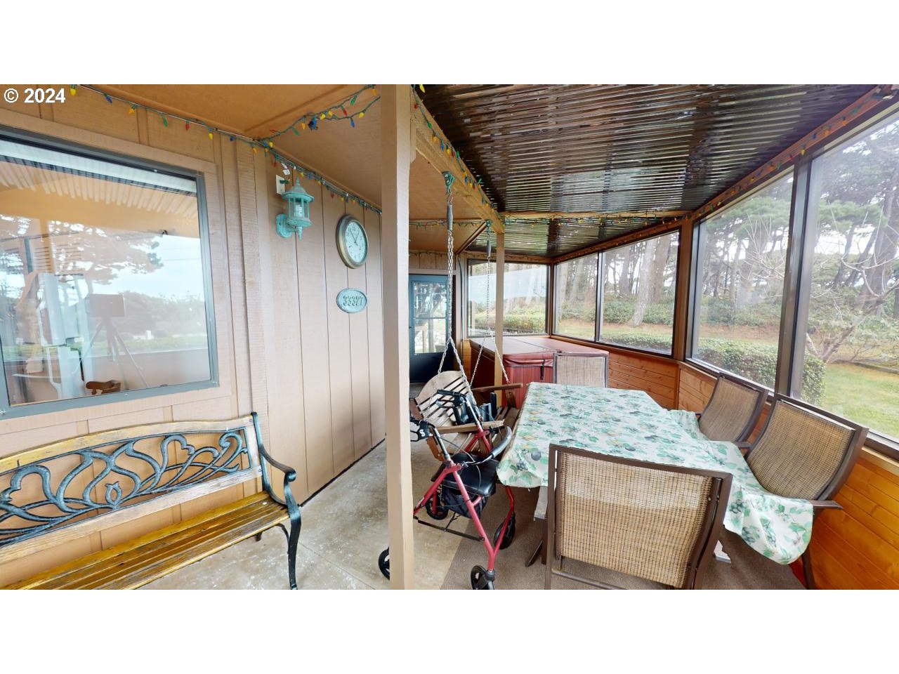 33327 Ophir Road Gold Beach, OR 97444 - Photo 28 of 32 a balcony with furniture and large windows