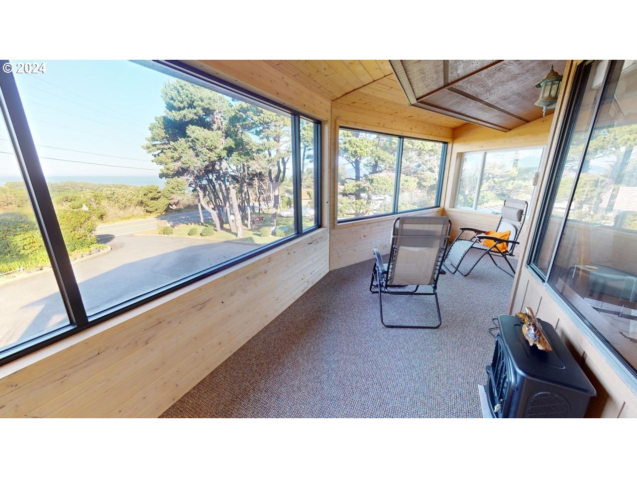 33327 Ophir Road Gold Beach, OR 97444 - Photo 3 of 32 a kitchen with a table and chairs