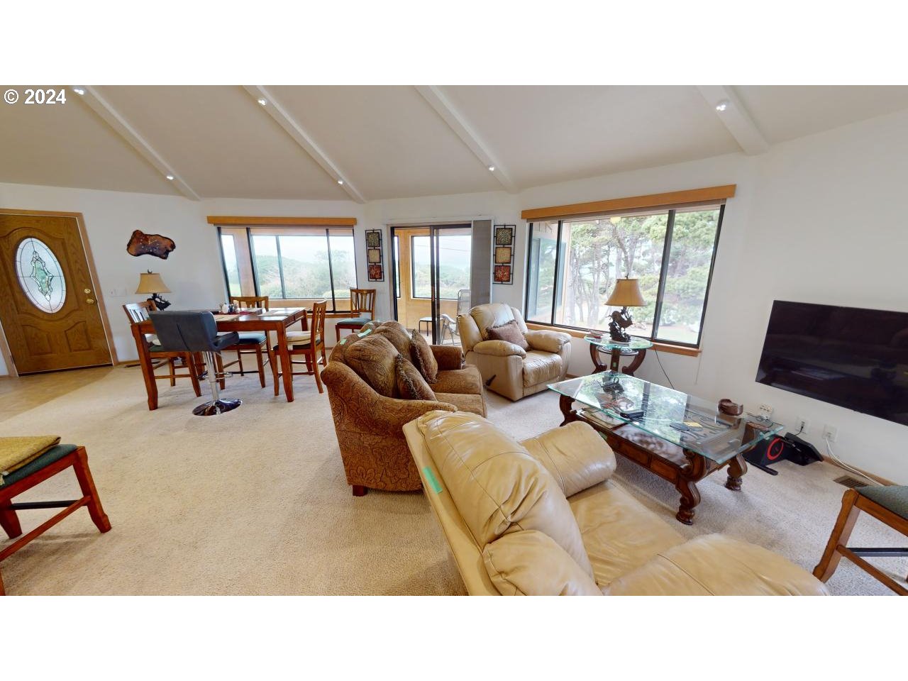 33327 Ophir Road Gold Beach, OR 97444 - Photo 7 of 32 a living room with furniture and a large window