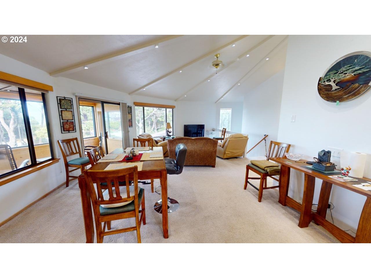33327 Ophir Road Gold Beach, OR 97444 - Photo 8 of 32 a living room with furniture a rug and a large window