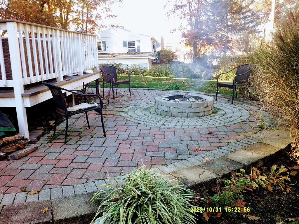 77 Indian Run Road, Unit 77 Bellingham, MA 02019 - Photo 4 of 18 a view of yard with patio