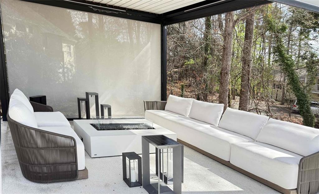 1046 Wiley Bridge Road Woodstock, GA 30188 - Photo 3 of 4 a living room with furniture and a large window