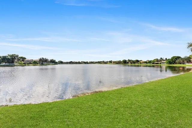 a view of a lake with a big yard