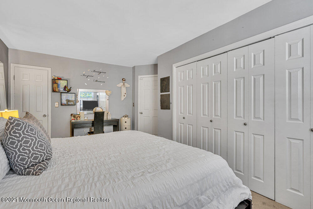 39 Bramble Lane Matawan, NJ 07747 - Photo 13 of 28 a bedroom with a bed and closet