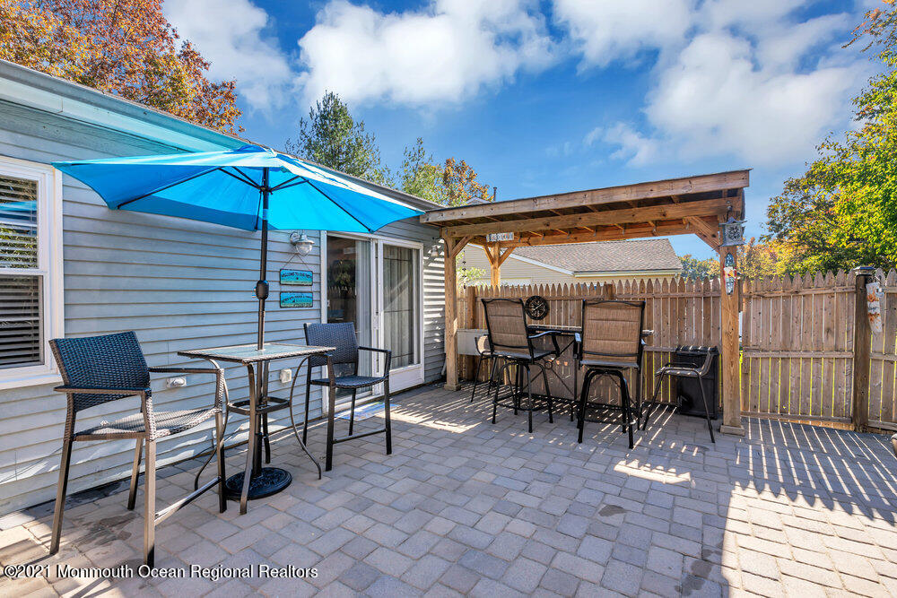 39 Bramble Lane Matawan, NJ 07747 - Photo 20 of 28 an outdoor space with furniture