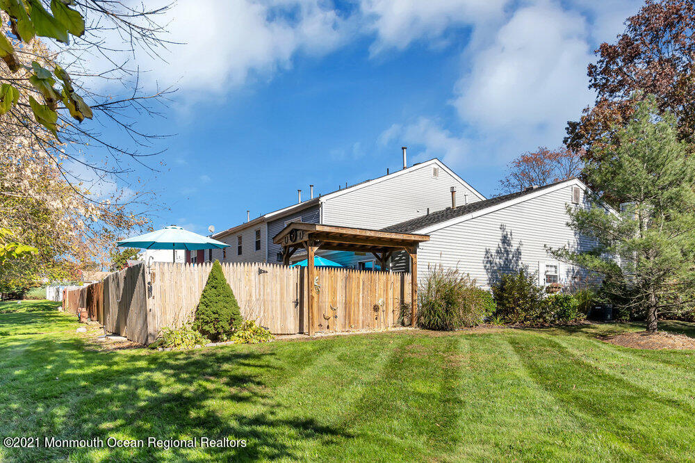 39 Bramble Lane Matawan, NJ 07747 - Photo 23 of 28 a view of a house with a yard
