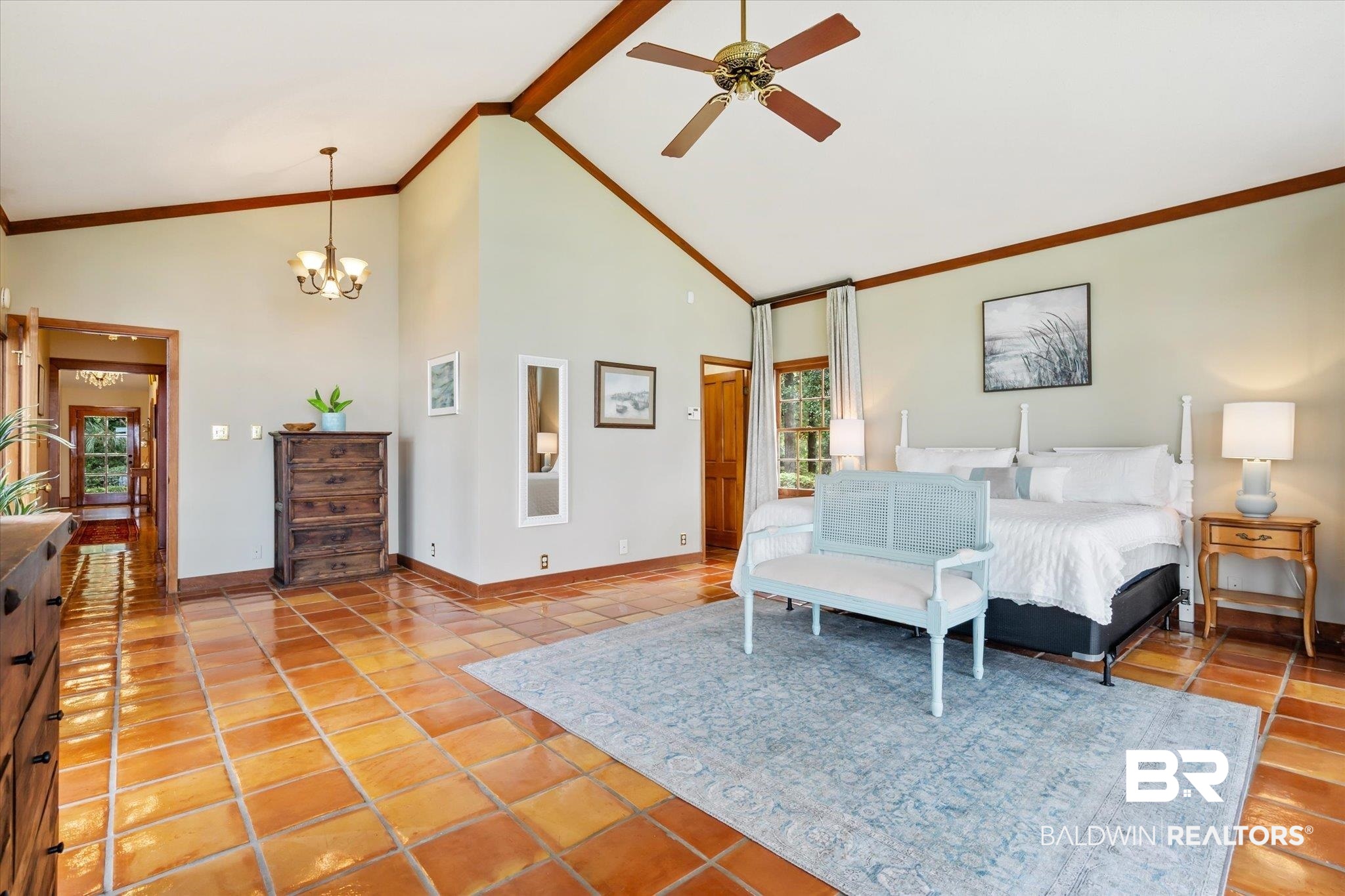 2228 Riverside Drive Mobile, AL 36605 - Photo 23 of 51 Bedroom featuring high vaulted ceiling, tile patterned floors, ceiling fan with notable chandelier, crown molding, and beam ceiling