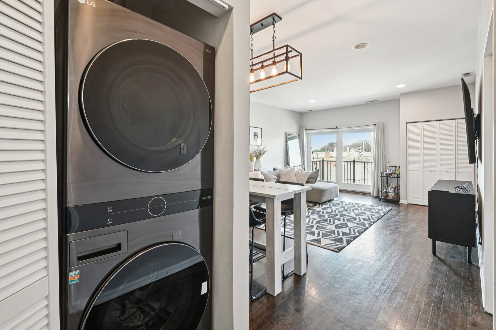 828 West 31st Street, Unit 3N Chicago, IL 60608 - Photo 11 of 29 a living room with furniture a fireplace and a table