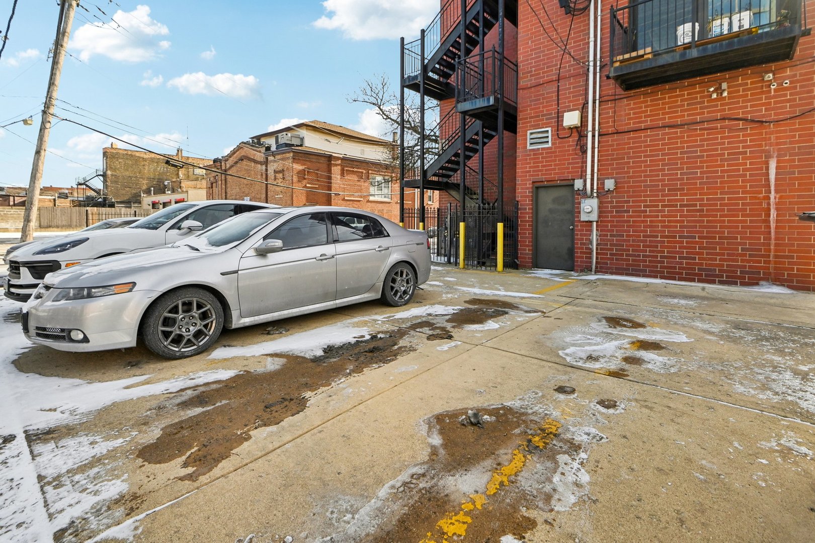 828 West 31st Street, Unit 3N Chicago, IL 60608 - Photo 26 of 29 a car parked in front of a building