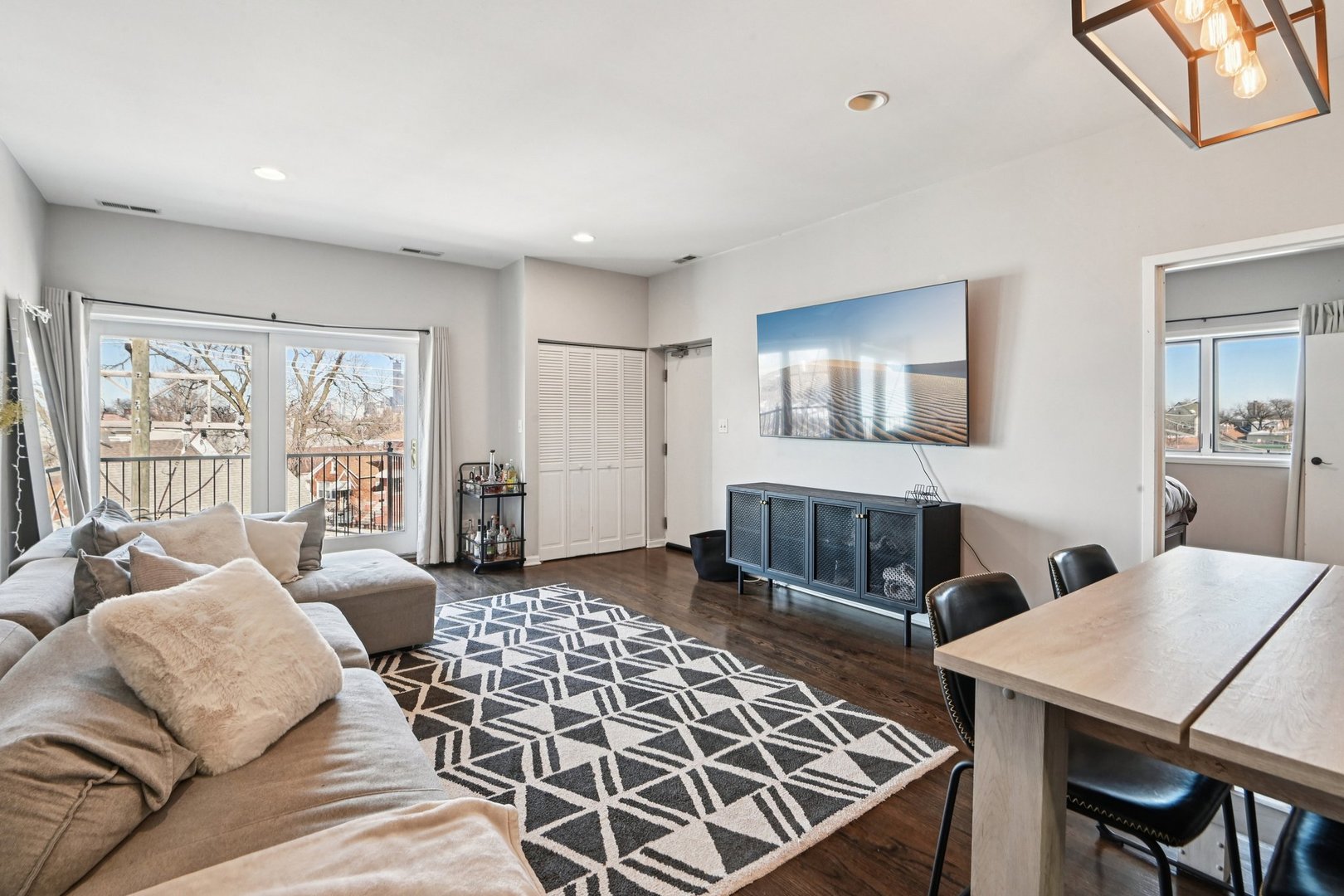 828 West 31st Street, Unit 3N Chicago, IL 60608 - Photo 4 of 29 a bedroom with furniture and wooden floor