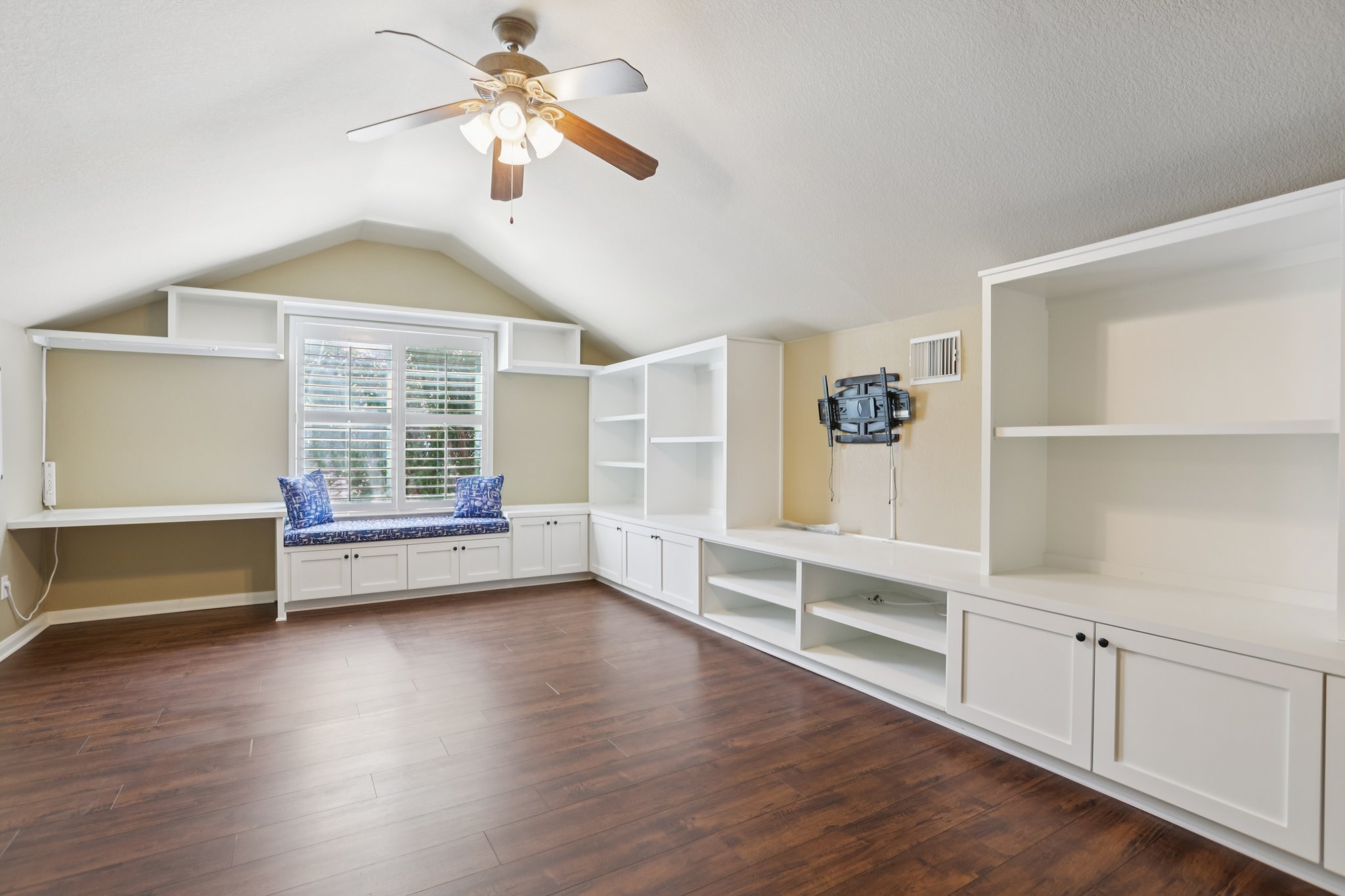 10525 Roy Butler Drive Austin, TX 78717 - Photo 27 of 40 Bonus room upstairs with plenty of built-ins. This room could be used as a bedroom if a 5th bedroom was needed.