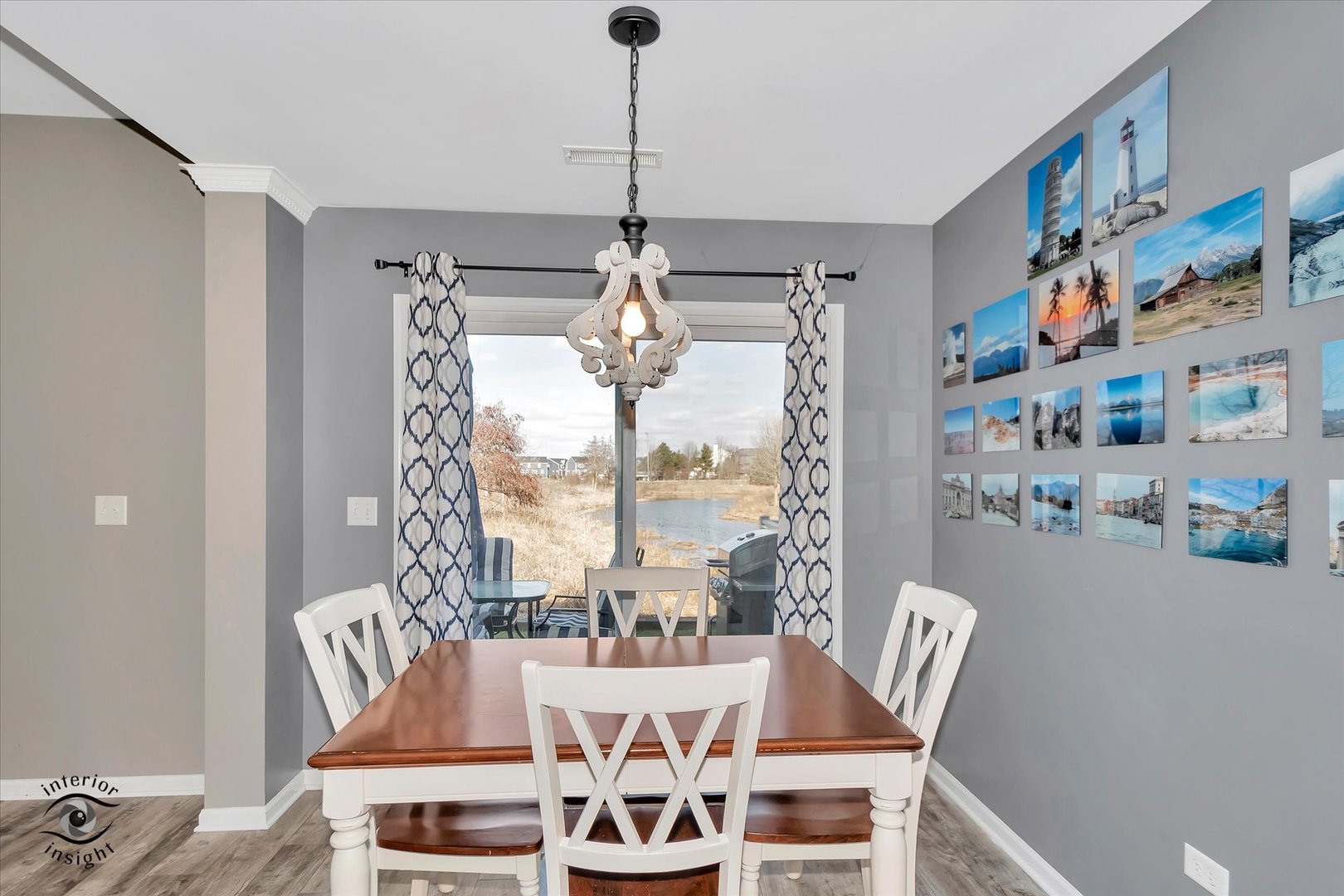 15128 Pinewood Road Lockport, IL 60441 - Photo 6 of 27 a dining room with furniture a chandelier and window