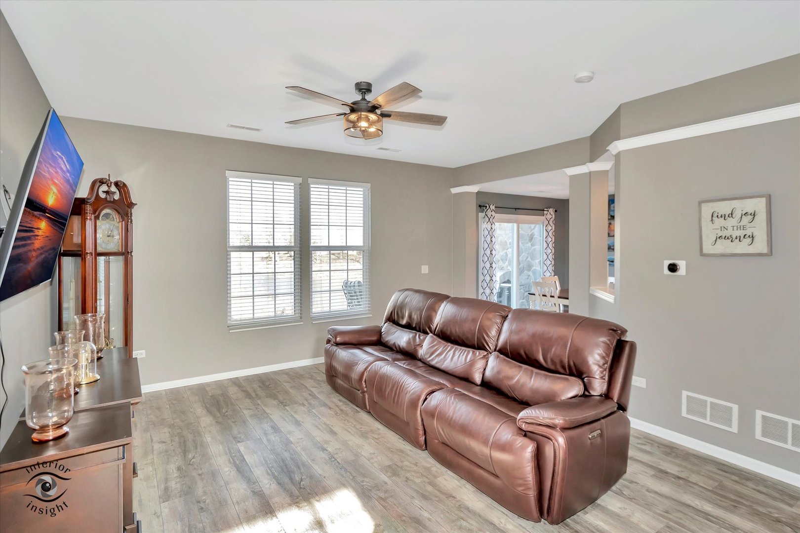 15128 Pinewood Road Lockport, IL 60441 - Photo 10 of 27 a living room with furniture and a flat screen tv