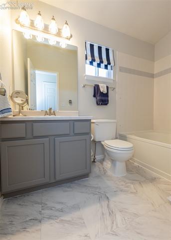 8587 Saddleman Road Peyton, CO 80831 - Photo 20 of 31 Spacious full bathroom upstairs