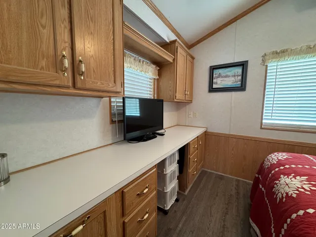 a view of an outdoor space with wooden floor