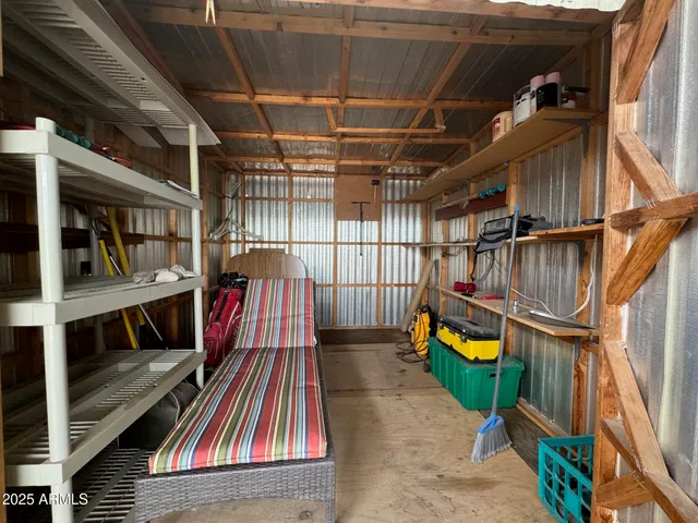 a view of parking garage with furniture