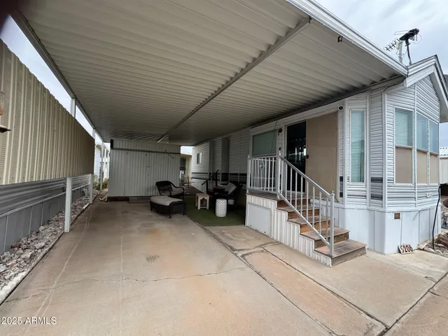 a view of swimming pool with seating area
