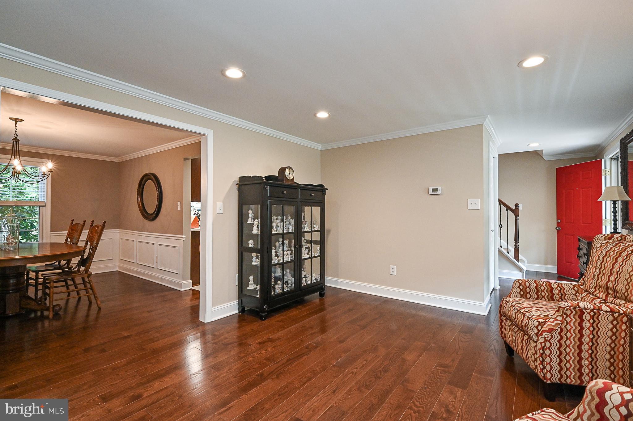 7721 Middle Valley Drive Springfield, VA 22153 - Photo 14 of 33 Living room with gorgeous wide plank floors
