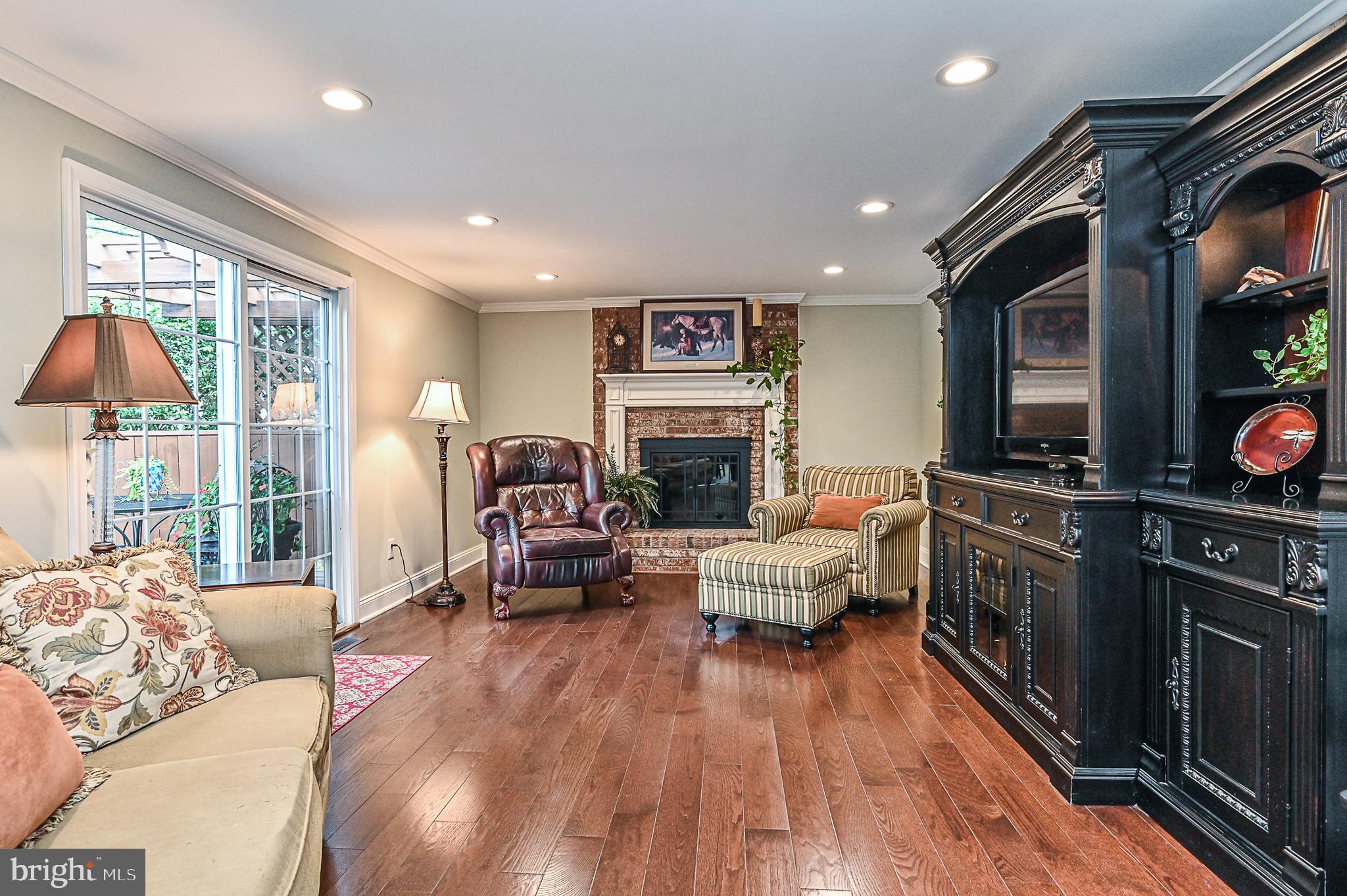 7721 Middle Valley Drive Springfield, VA 22153 - Photo 8 of 33 Large Family room with wood burning fireplace