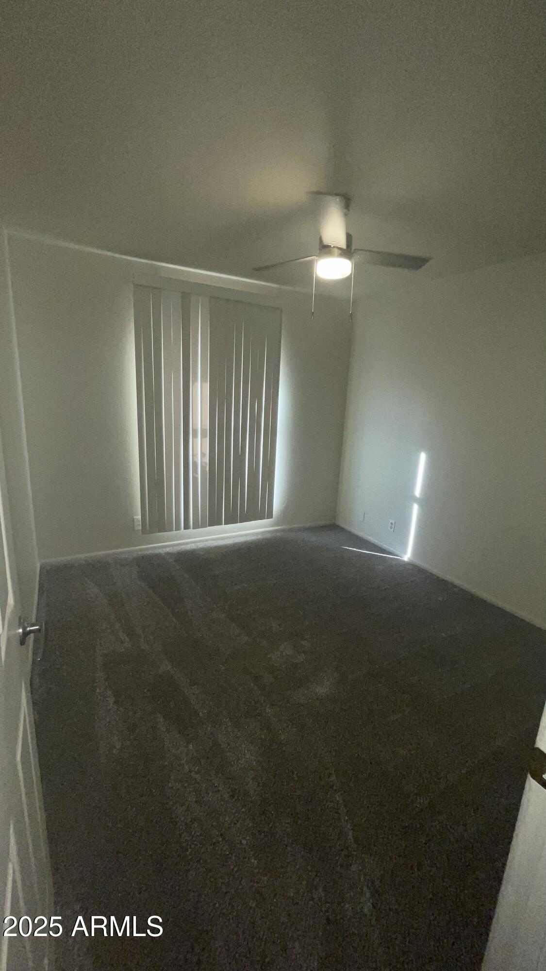17811 North 29th Drive Phoenix, AZ 85053 - Photo 10 of 14 a view of an empty room