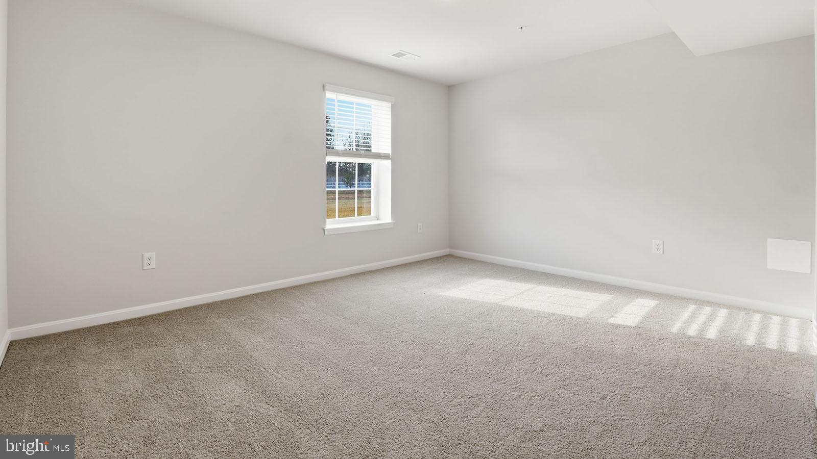 8110 Cypress Pt Drive Rosedale, MD 21237 - Photo 13 of 37 an empty room with a window