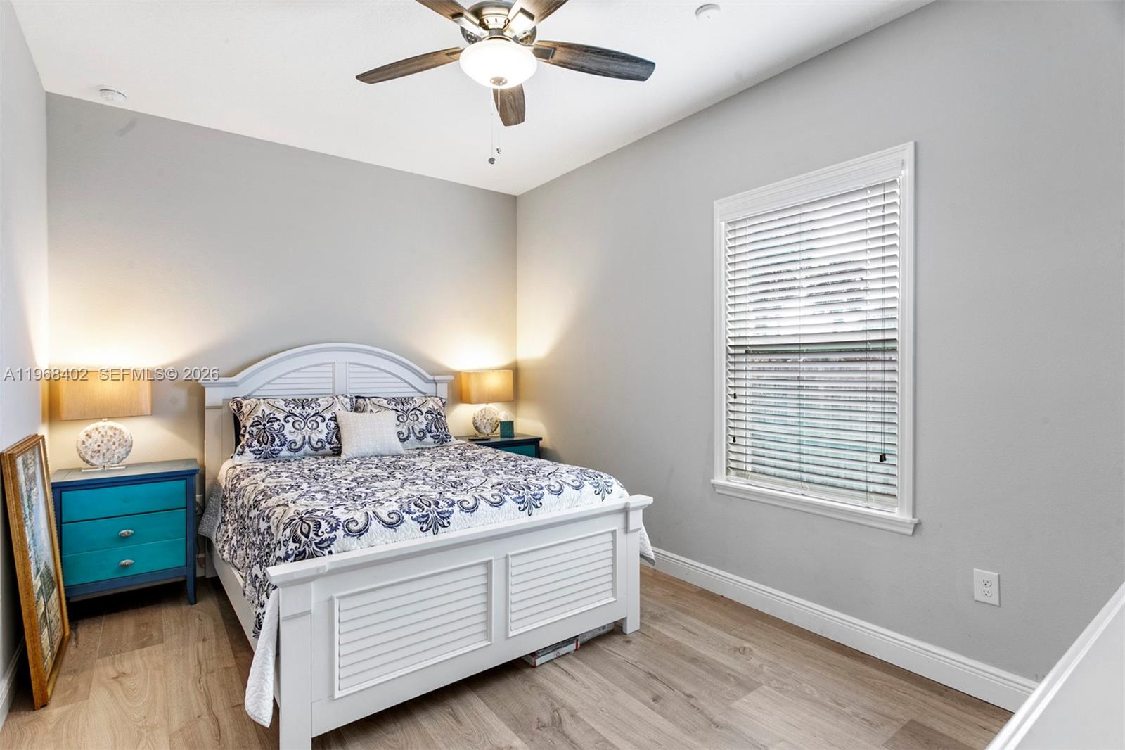 1773 Southwest Palermo Road Port St. Lucie, FL 34987 - Photo 24 of 50 Bedroom 4 - seperate from other bedrooms, great for a guest suite or game room... Laminate floors, volume ceilings and upscale fan/light.
