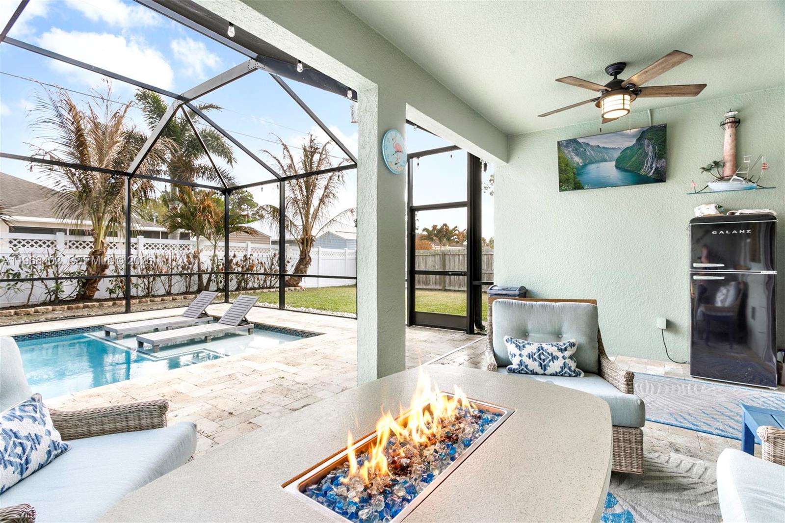 1773 Southwest Palermo Road Port St. Lucie, FL 34987 - Photo 3 of 50 Relax in the evening on your private patio/pool area.