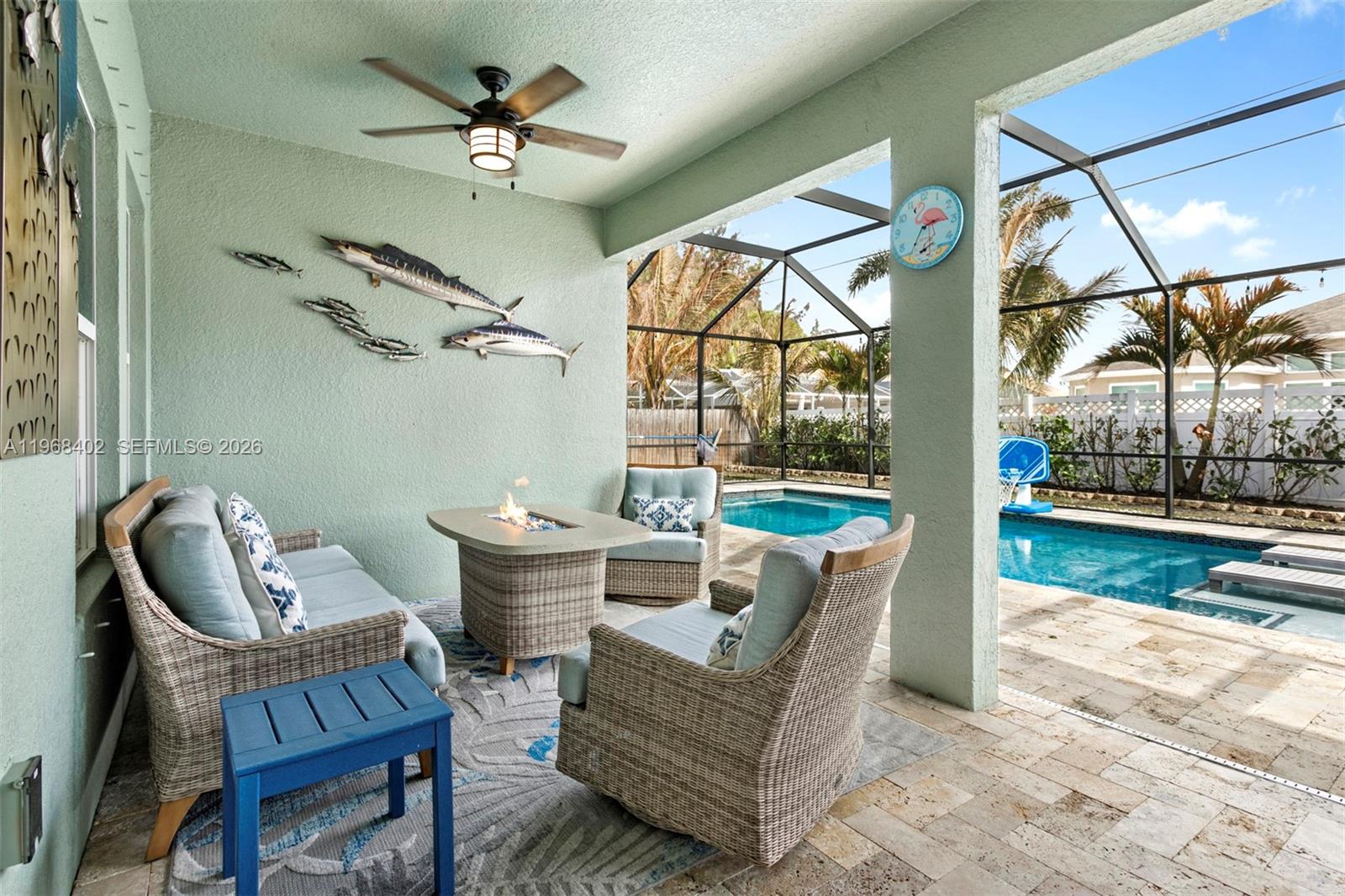 1773 Southwest Palermo Road Port St. Lucie, FL 34987 - Photo 31 of 50 Spacious covered back patio overlooking the sparkling pool - relax and enjoy!!
